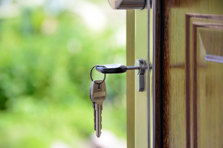 A key in a door’s keyhole