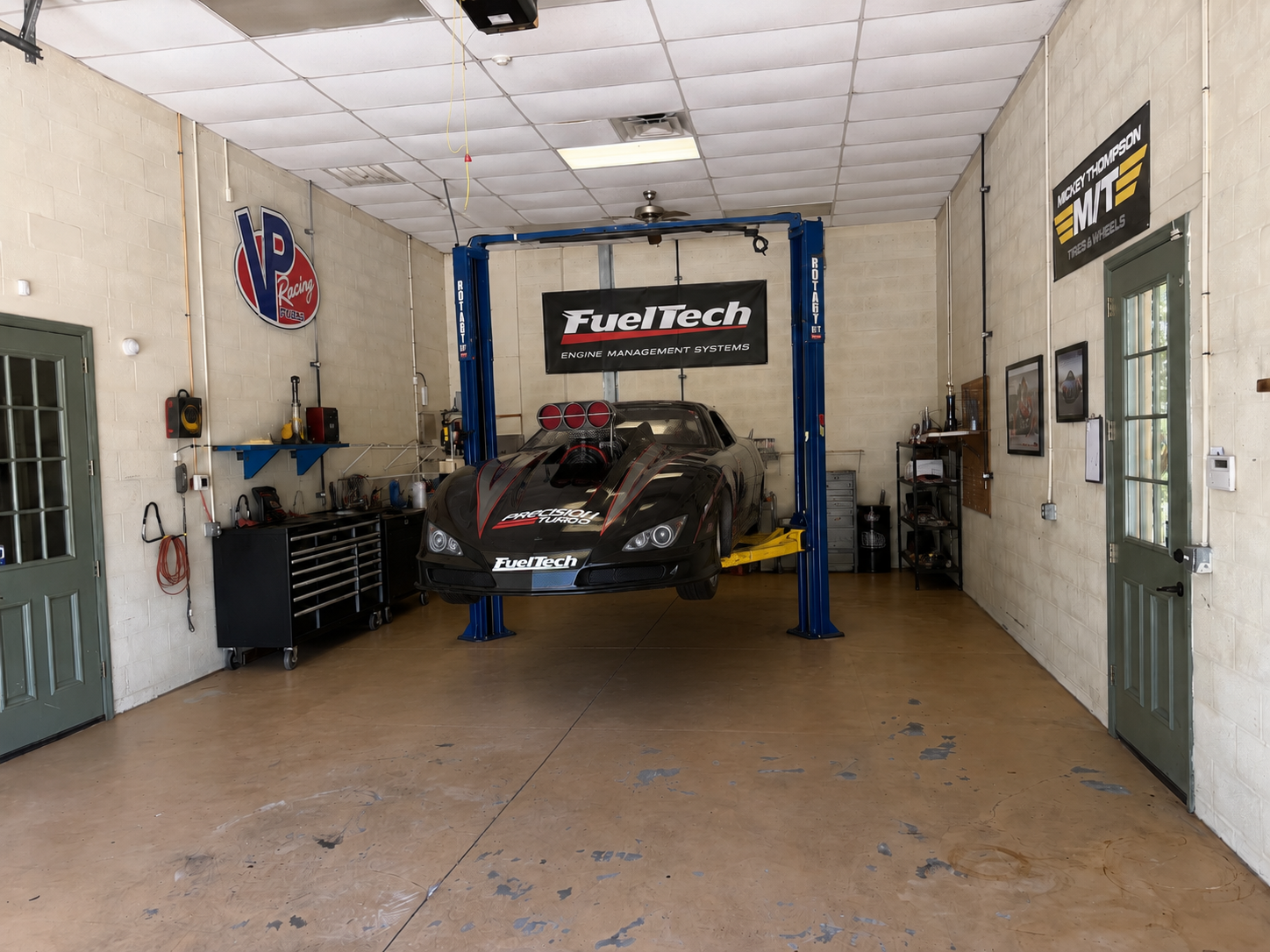 Automotive garage with professional vehicle lift