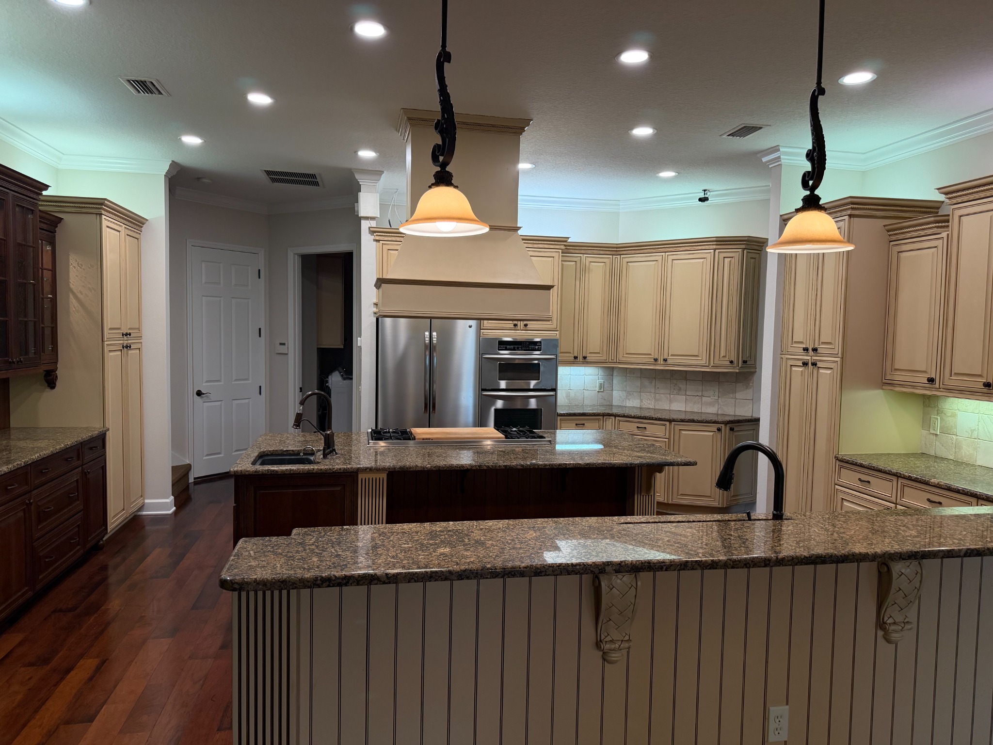 Large custom kitchen with island and cabinetry