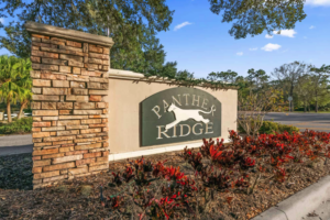 Panther Ridge housing market report — community entrance sign in Lakewood Ranch, Florida